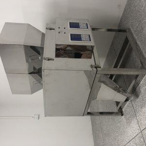 Dual channel filling machine, simultaneously filling two different particle products - Image 5